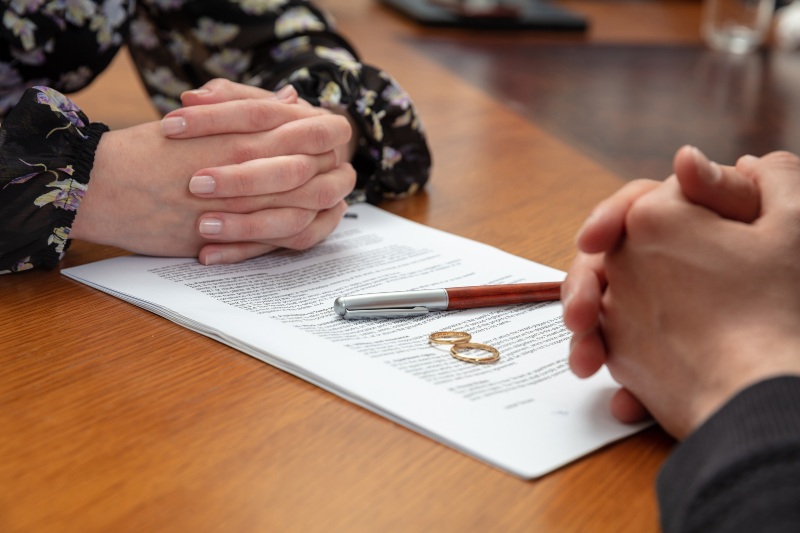 Divorce papers with rings on the lawyer’s desk in Ogden, UT